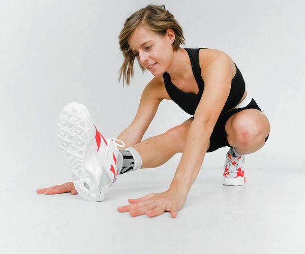 Dynamic yoga pose showing strength and flexibility.